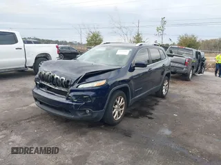 2014 Jeep Cherokee Latitude with VIN 1C4PJLCS2EW228418, listed as a IAAI auction lot 41416407 with 154,192 mi miles. Bid and sale history available at carsss.com. Image 2.