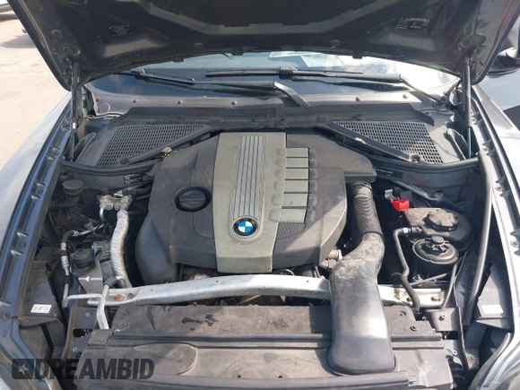 2012 BMW X5 35d with VIN 5UXZW0C56CL664575, listed as a IAAI auction lot 42559674 with 157,554 mi miles and . Bid and sale history available at DreamBid. Image 10.