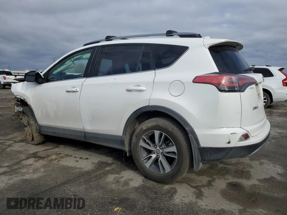 2018 Toyota RAV4 XLE with VIN 2T3WFREV1JW471752, listed as a Copart auction lot 46952565 with 87,705 mi miles and Salvage Title. Bid and sale history available at DreamBid. Image 2.