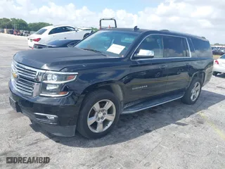 2017 Chevrolet Suburban Premier with VIN 1GNSCJKC4HR127667, listed as a IAAI auction lot 41936945 with 139,006 mi miles. Bid and sale history available at carsss.com. Image 2.