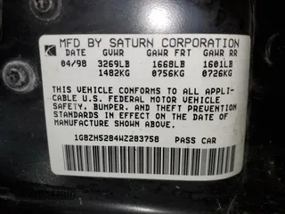 1998 Saturn SL with VIN 1G8ZH5284WZ283758, listed as a Copart auction lot 51630555 with 200,690 mi miles and Salvage title. Bid and sale history available at DreamBid. Image 15.