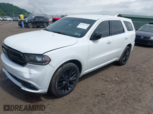 2015 Dodge Durango SXT with VIN 1C4RDJAG6FC786715, listed as a IAAI auction lot 42328713 with 165,651 mi miles and . Bid and sale history available at DreamBid. Image 2.