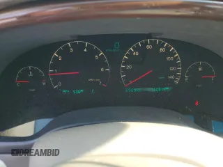 2003 Cadillac DeVille DTS z VIN 1G6KF57933U147843, wystawiony jako Copart lot #55875195 z przebiegiem 160 814 mil mil oraz Szkody całkowita. Historia ofert i sprzedaży dostępna na DreamBid. Obrazek 9.