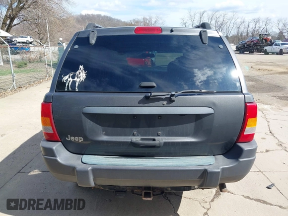 2003 Jeep Grand Cherokee Laredo with VIN 1J4GX48S53C504225, listed as a IAAI auction lot 41879669 with 247,246 mi miles. Bid and sale history available at carsss.com. Image 17.