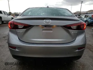 2015 Mazda 3 i Grand Touring z VIN JM1BM1W76F1239689, wystawiony jako Copart lot #55343985 z przebiegiem 14 789 mil mil oraz Szkoda całkowita • Salvage title. Historia ofert i sprzedaży dostępna na DreamBid. Obrazek 6.