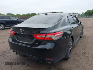 2019 Toyota Camry LE z VIN 4T1B11HK0KU739121, wystawiony jako IAAI lot #42372066 z przebiegiem 95 576 mil mil oraz . Historia ofert i sprzedaży dostępna na DreamBid. Obrazek 16.