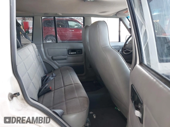1996 Jeep Cherokee Sport with VIN 1J4FJ68S5TL259449, listed as a IAAI auction lot 42376697 with 72,835 mi miles and . Bid and sale history available at DreamBid. Image 8.