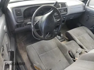 1999 Nissan Frontier XE with VIN 1N6DD26S6XC332458, listed as a Copart auction lot 48028715 with 182,706 mi miles and Salvage title. Bid and sale history available at DreamBid. Image 8.