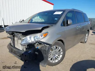 2015 Toyota Sienna XLE with VIN 5TDYK3DC8FS547056, listed as a IAAI auction lot 41387793 with 140,767 mi miles. Bid and sale history available at carsss.com. Image 18.
