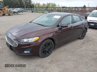 2019 Ford Fusion SE with VIN 3FA6P0HD0KR136232, listed as a IAAI auction lot 42015102 with 66,472 mi miles. Bid and sale history available at carsss.com. Image 2.