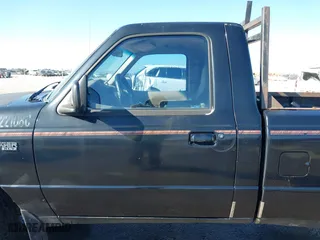 1998 Ford Ranger XL with VIN 1FTYR10C1WPB40423, listed as a IAAI auction lot 41621407 with 122,656 mi miles. Bid and sale history available at carsss.com. Image 14.