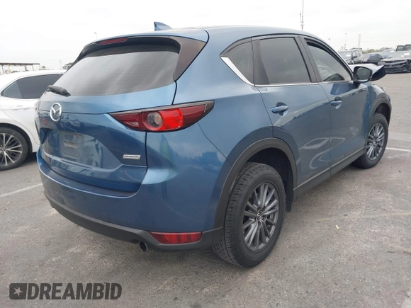 2017 Mazda CX-5 Sport with VIN JM3KFABL9H0142189, listed as a IAAI auction lot 41722354 with 109,865 mi miles. Bid and sale history available at carsss.com. Image 4.