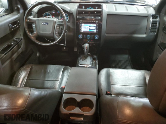 2012 Ford Escape Limited z VIN 1FMCU9EG1CKB16341, wystawiony jako Copart lot #57063845 z przebiegiem 128 205 mil mil oraz Szkoda całkowita • Salvage title. Historia ofert i sprzedaży dostępna na DreamBid. Obrazek 8.