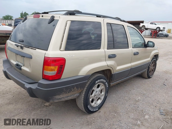 2001 Jeep Grand Cherokee Laredo with VIN 1J4GW48S51C566319, listed as a IAAI auction lot 42184875 with 148,471 mi miles and . Bid and sale history available at DreamBid. Image 4.