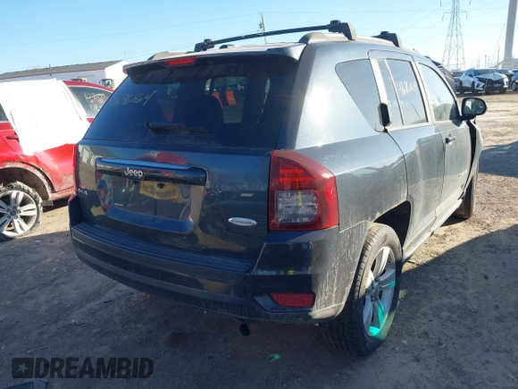 2014 Jeep Compass Latitude with VIN 1C4NJDEB7ED623202, listed as a IAAI auction lot 41696864 with 89,129 mi miles. Bid and sale history available at carsss.com. Image 4.