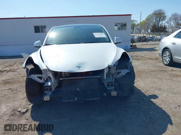 2021 Tesla Model Y Long Range with VIN 5YJYGDEE4MF122362, listed as a IAAI auction lot 42096138 with 47,006 mi miles and . Bid and sale history available at DreamBid. Image 6.