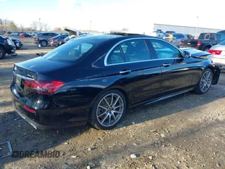 2021 Mercedes-Benz E-Class E 450 with VIN W1KZF5KB8MB002449, listed as a IAAI auction lot 41224307 with 57,093 mi miles. Bid and sale history available at carsss.com. Image 4.