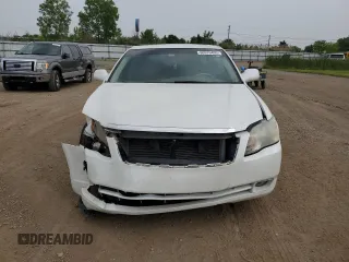 2007 Toyota Avalon XL z VIN 4T1BK36B17U230285, wystawiony jako Copart lot #60976495 z przebiegiem 63 013 mil mil oraz Szkoda całkowita • Salvage title. Historia ofert i sprzedaży dostępna na DreamBid. Obrazek 5.