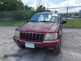 2000 Jeep Grand Cherokee Laredo with VIN 1J4G258S4YC381030, listed as a IAAI auction lot 42541918 with 306,934 mi miles and . Bid and sale history available at DreamBid. Image 6.