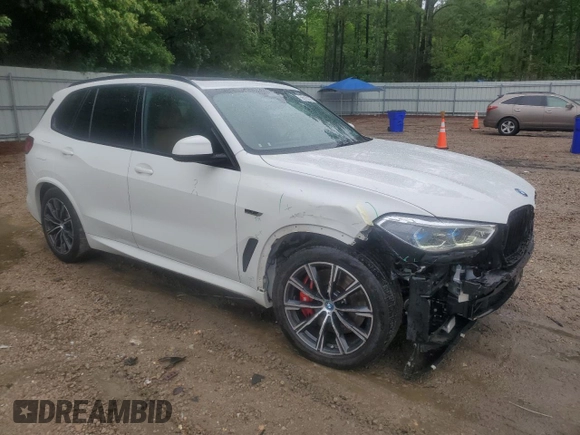 2023 BMW X5 xDrive45e with VIN 5UXTA6C08P9R00349, listed as a Copart auction lot 56510275 with 40,930 mi miles and Salvage title. Bid and sale history available at DreamBid. Image 4.