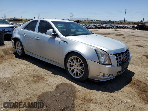 2012 Cadillac CTS Performance with VIN 1G6DK5E3XC0137143, listed as a Copart auction lot 53891815 with 123,174 mi miles and Salvage Title. Bid and sale history available at DreamBid. Image 4.