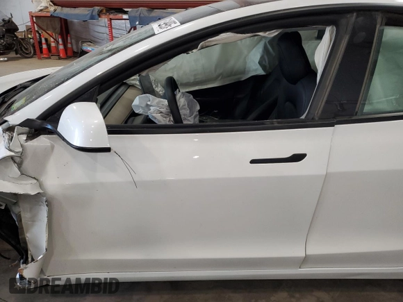 2021 Tesla Model 3 Standard Range Plus z VIN 5YJ3E1EA7MF986964, wystawiony jako Copart lot #55119995 z przebiegiem Nie podano mil oraz Szkody całkowita. Historia ofert i sprzedaży dostępna na DreamBid. Obrazek 7.