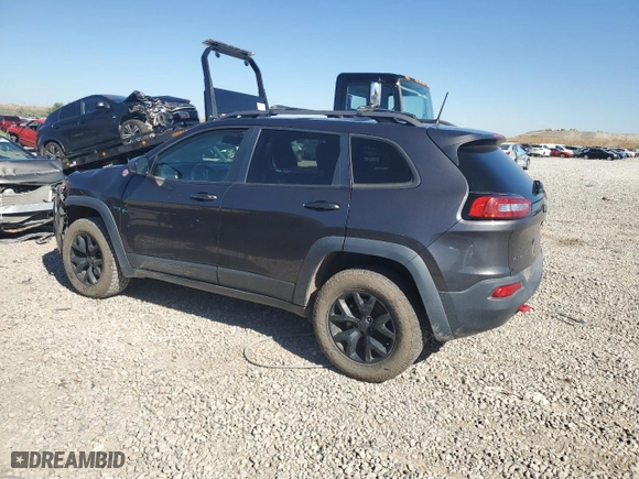 2017 Jeep Cherokee Trailhawk with VIN 1C4PJMBS7HW656996, listed as a Copart auction lot 64839364 with 100,465 mi miles and Salvage Title. Bid and sale history available at carsss.com. Image 2.