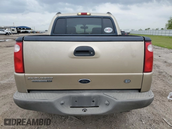 2003 Ford Explorer Sport Trac XLS with VIN 1FMZU67E13UB28854, listed as a Copart auction lot 50653695 with 179,040 mi miles and Salvage title. Bid and sale history available at DreamBid. Image 6.
