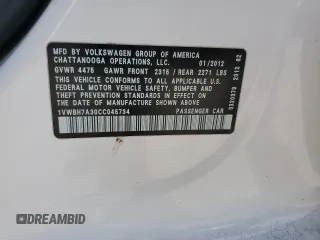 2012 Volkswagen Passat SE with VIN 1VWBH7A30CC045734, listed as a Copart auction lot 61510605 with 130,035 mi miles and Salvage title. Bid and sale history available at DreamBid. Image 13.