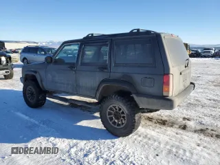 2001 Jeep Cherokee Sport with VIN 1J4FT48S41L615093, listed as a Copart auction lot 88459365 with 257,336 mi miles and Clean Title. Bid and sale history available at carsss.com. Image 2.
