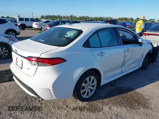 2021 Toyota Corolla LE with VIN 5YFEPMAE8MP233669, listed as a IAAI auction lot 41774096 with 126,483 mi miles and . Bid and sale history available at DreamBid. Image 4.