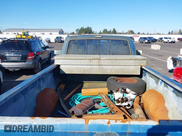 1990 Ford F-150 with VIN 1FTEF14NXLPB58633, listed as a IAAI auction lot 41685084 with 42,018 mi miles. Bid and sale history available at carsss.com. Image 8.