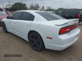 2014 Dodge Charger SXT with VIN 2C3CDXHG1EH122157, listed as a IAAI auction lot 41693517 with 191,095 mi miles and . Bid and sale history available at carsss.com. Image 3.