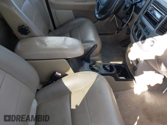 2003 Ford Escape XLT Popular 2 with VIN 1FMYU93113KB33578, listed as a IAAI auction lot 41985463 with 103,500 mi miles and . Bid and sale history available at DreamBid. Image 5.