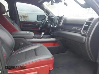 2022 Ram 1500 TRX with VIN 1C6SRFU98NN334983, listed as a IAAI auction lot 42010145 with 19,207 mi miles and . Bid and sale history available at DreamBid. Image 5.