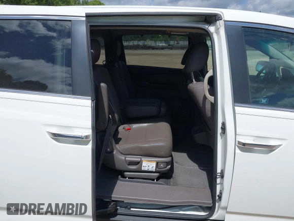 2012 Honda Odyssey EX-L with VIN 5FNRL5H62CB019238, listed as a IAAI auction lot 42524694 with 271,384 mi miles and . Bid and sale history available at DreamBid. Image 8.