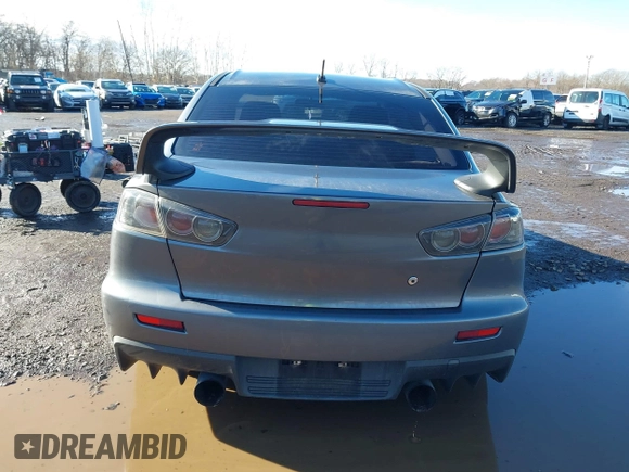 2008 Mitsubishi Lancer Evolution GSR with VIN JA3AW86V18U044077, listed as a IAAI auction lot 41208625 with 157,788 mi miles. Bid and sale history available at carsss.com. Image 16.