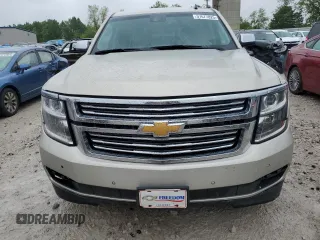 2015 Chevrolet Tahoe LTZ z VIN 1GNSKCKC5FR100084, wystawiony jako Copart lot #57677825 z przebiegiem 141 987 mil mil oraz Czysty tytuł • Clean title. Historia ofert i sprzedaży dostępna na DreamBid. Obrazek 5.