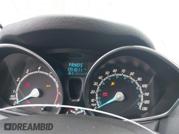 2019 Ford Fiesta SE z VIN 3FADP4EJ5KM132862, wystawiony jako IAAI lot #40893430 z przebiegiem 91 011 mil mil oraz . Historia ofert i sprzedaży dostępna na DreamBid. Obrazek 7.