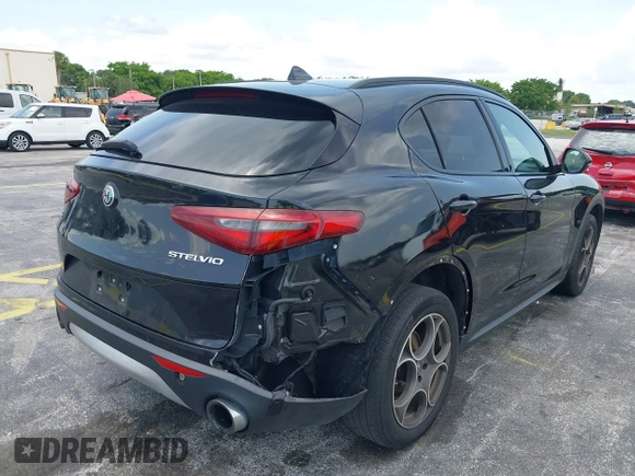 2018 Alfa Romeo Stelvio Sport z VIN ZASFAKPN8J7B58624, wystawiony jako IAAI lot #42380149 z przebiegiem 99 898 mil mil oraz . Historia ofert i sprzedaży dostępna na DreamBid. Obrazek 6.