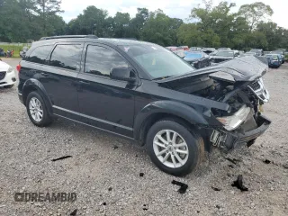 2019 Dodge Journey SE with VIN 3C4PDCBB8KT774151, listed as a Copart auction lot 60909755 with 170,379 mi miles and Salvage title. Bid and sale history available at DreamBid. Image 4.