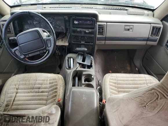 1995 Jeep Grand Cherokee Laredo with VIN 1J4GZ58S7SC743239, listed as a Copart auction lot 81717114 with 254,061 mi miles and Salvage Title. Bid and sale history available at carsss.com. Image 8.