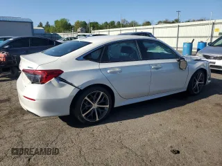 2024 Honda Civic Touring z VIN 2HGFE1F94RH313375, wystawiony jako Copart lot #54844905 z przebiegiem Nie podano mil oraz Szkoda całkowita • Salvage title. Historia ofert i sprzedaży dostępna na DreamBid. Obrazek 3.