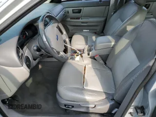 2007 Ford Taurus SEL with VIN 1FAFP56U57A126684, listed as a Copart auction lot 57342035 with 158,293 mi miles and Salvage title. Bid and sale history available at DreamBid. Image 7.