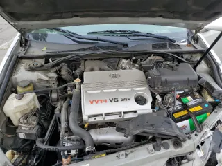 2005 Toyota Camry LE with VIN 4T1BF32KX5U601192, listed as a Copart auction lot 55365485 with 153,251 mi miles and Salvage Title. Bid and sale history available at DreamBid. Image 11.