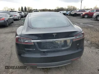 2014 Tesla Model S 60 with VIN 5YJSA1H18EFP45810, listed as a Copart auction lot 86313244 with Not Provided miles and Salvage Title. Bid and sale history available at DreamBid. Image 6.