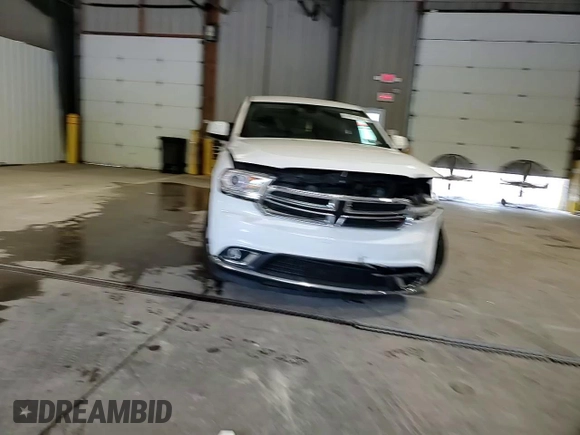 2016 Dodge Durango SXT with VIN 1C4RDJAG7GC460343, listed as a Copart auction lot 60974975 with 59,783 mi miles and Salvage title. Bid and sale history available at DreamBid. Image 14.