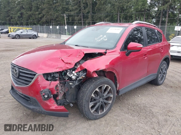 2016 Mazda CX-5 Grand Touring z VIN JM3KE4DY7G0687318, wystawiony jako IAAI lot #42228585 z przebiegiem 188 793 mil mil oraz . Historia ofert i sprzedaży dostępna na DreamBid. Obrazek 17.
