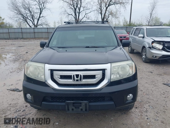 2011 Honda Pilot EX-L with VIN 5FNYF4H6XBB004269, listed as a IAAI auction lot 41947036 with 184,390 mi miles and . Bid and sale history available at carsss.com. Image 12.