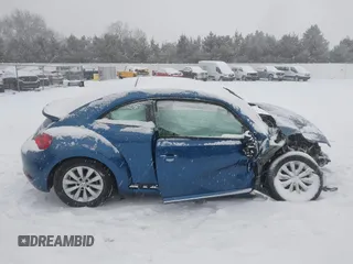 2019 Volkswagen Beetle S with VIN 3VWFD7ATXKM719544, listed as a IAAI auction lot 41565506 with 21,734 mi miles. Bid and sale history available at carsss.com. Image 13.